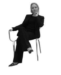 Coralie Meireles Stier seated in a chair